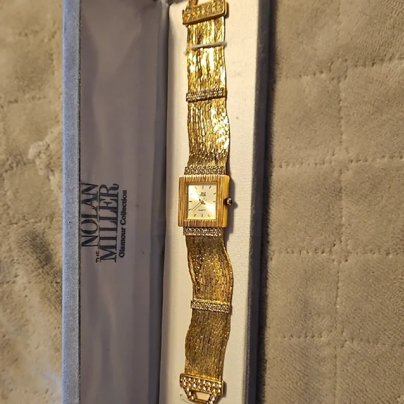 Nolan Miller Accessories Nolan Miller Gold Womens Watch Poshmark - Main Image